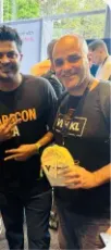 Vishal Rajpurohit posing with a fellow attendee wearing a Laracon t-shirt