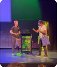 Vishal Rajpurohit in conversation on stage beside Laracon-branded signage